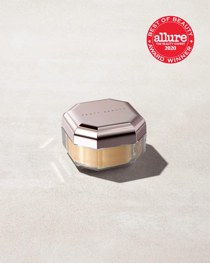 A jar of mini setting powder stood on a gray background with the Allure "Best of Beauty" award stamp overimposed