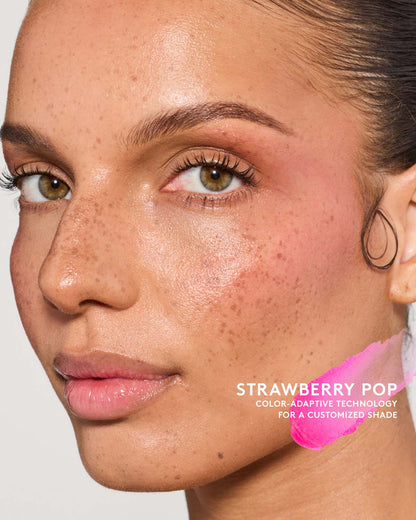 Model wearing match stix color adaptive in shade strawberry pop.